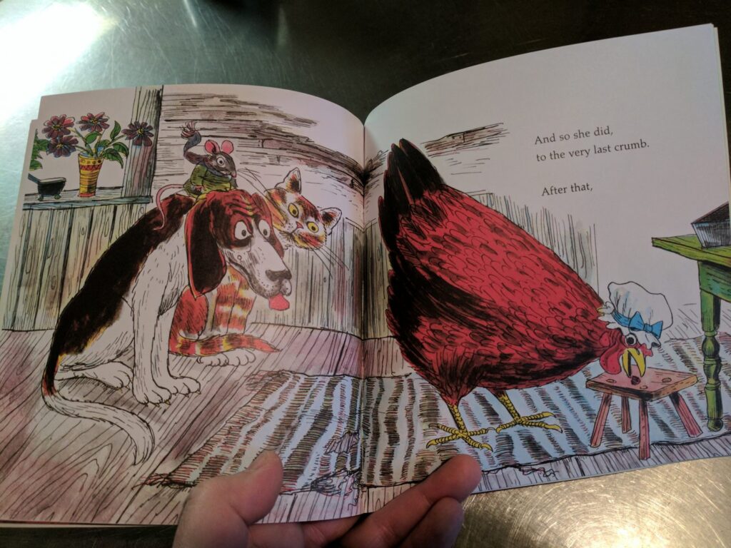 The Little Red Hen eating her cake while her lazy friends watch.
